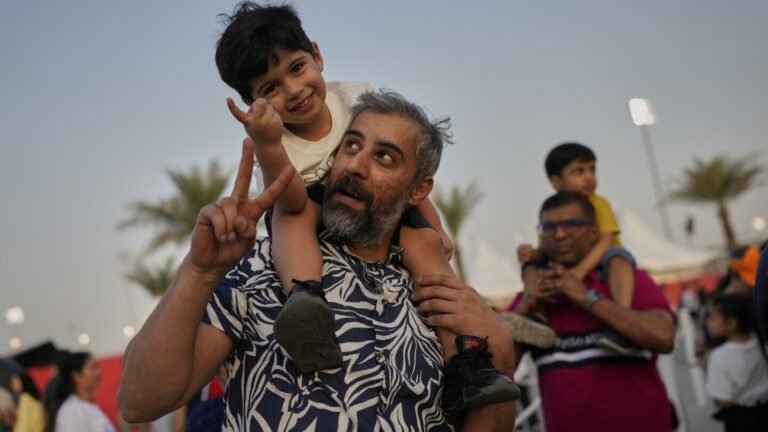 AP PHOTOS: Formula One fans flock to Bahrain race